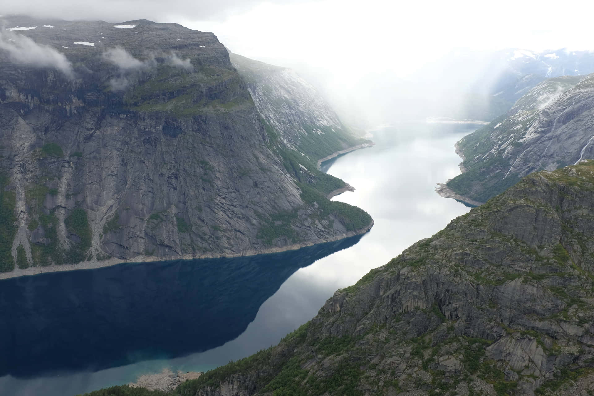 Trolltunga With Thick White Fog Wallpaper