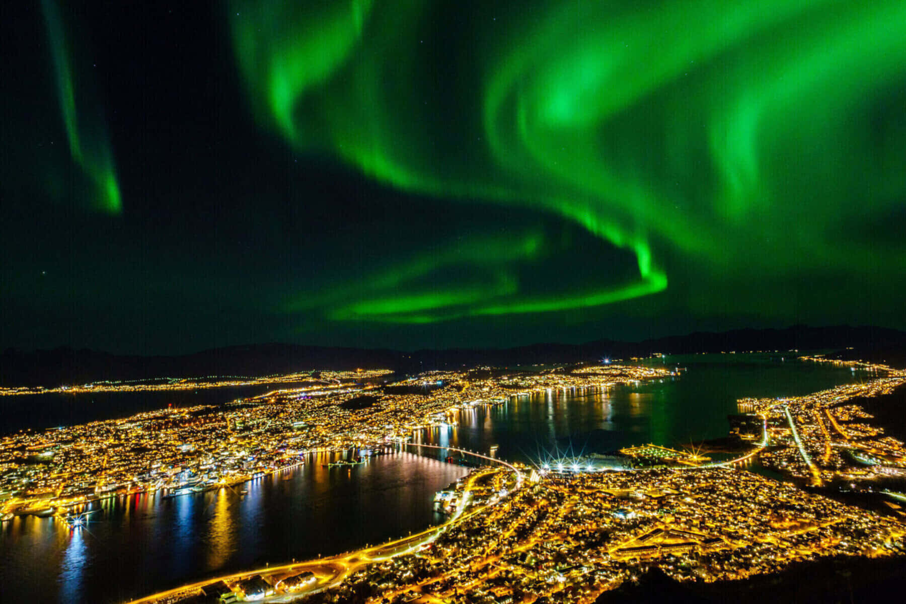 Tromso Northern Lights Over City Wallpaper