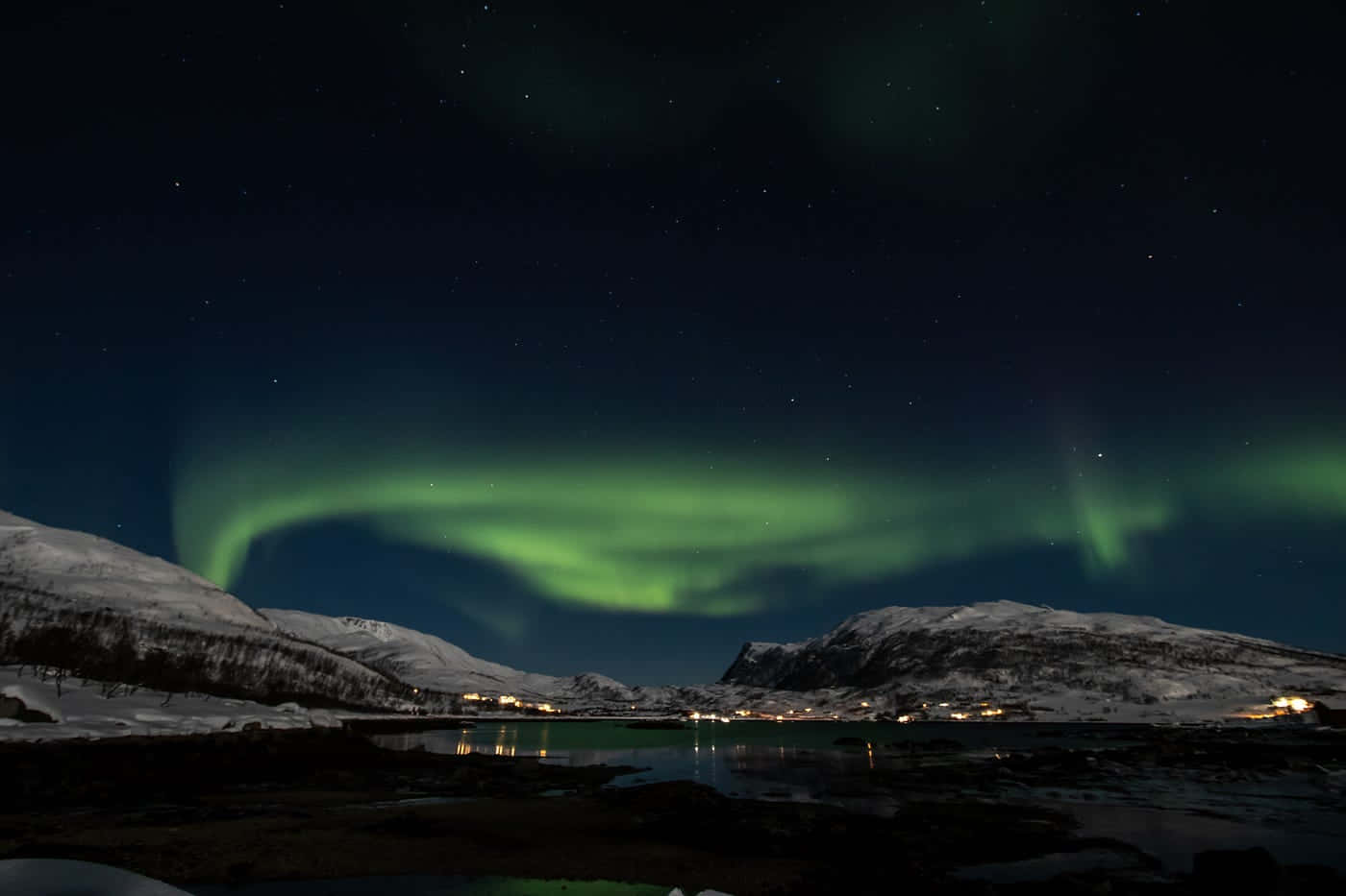 Tromso Northern Lights Over Snowy Landscape Wallpaper