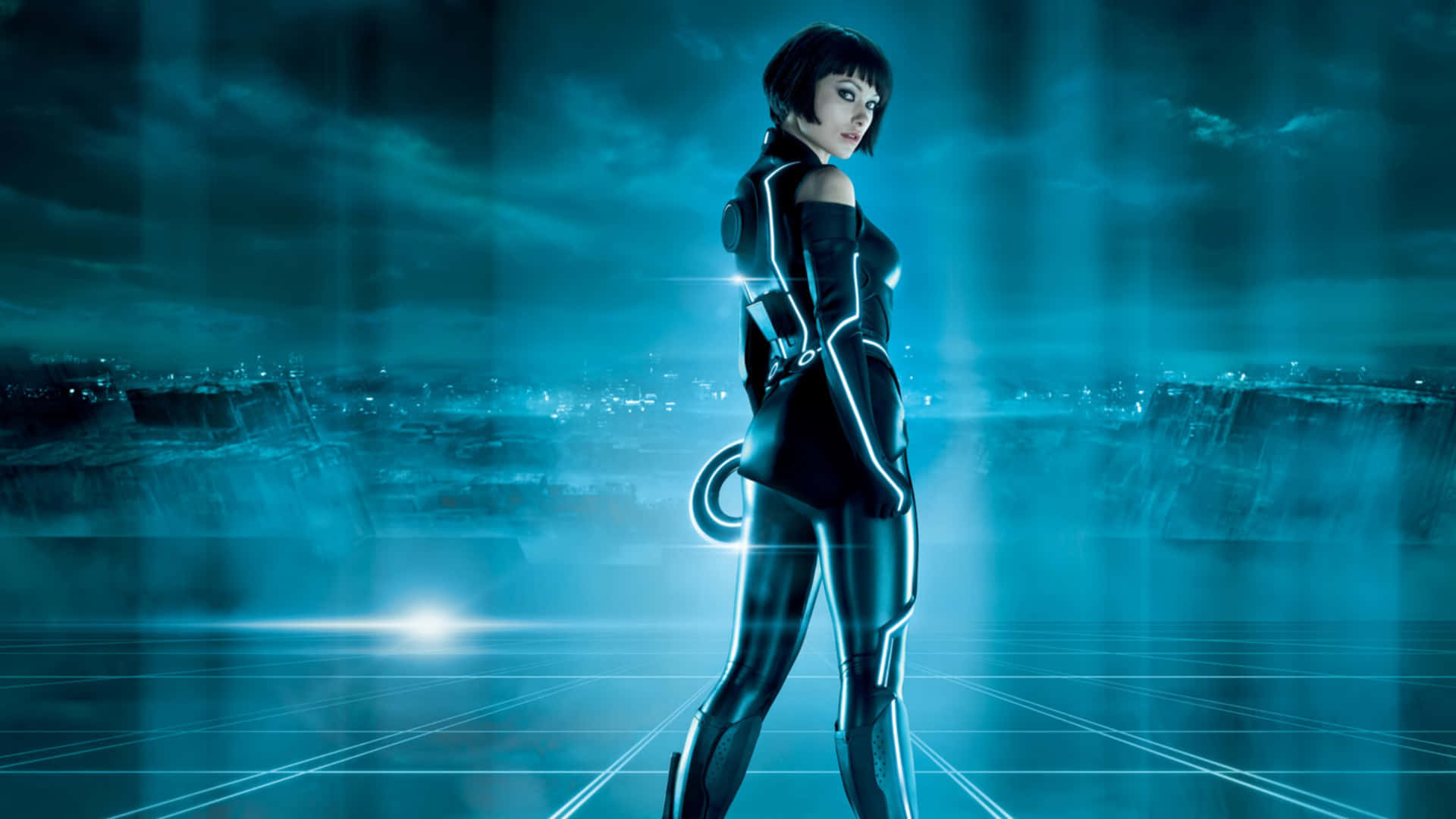 The vibrant lights dance in the darkness of the Tron Legacy world Wallpaper