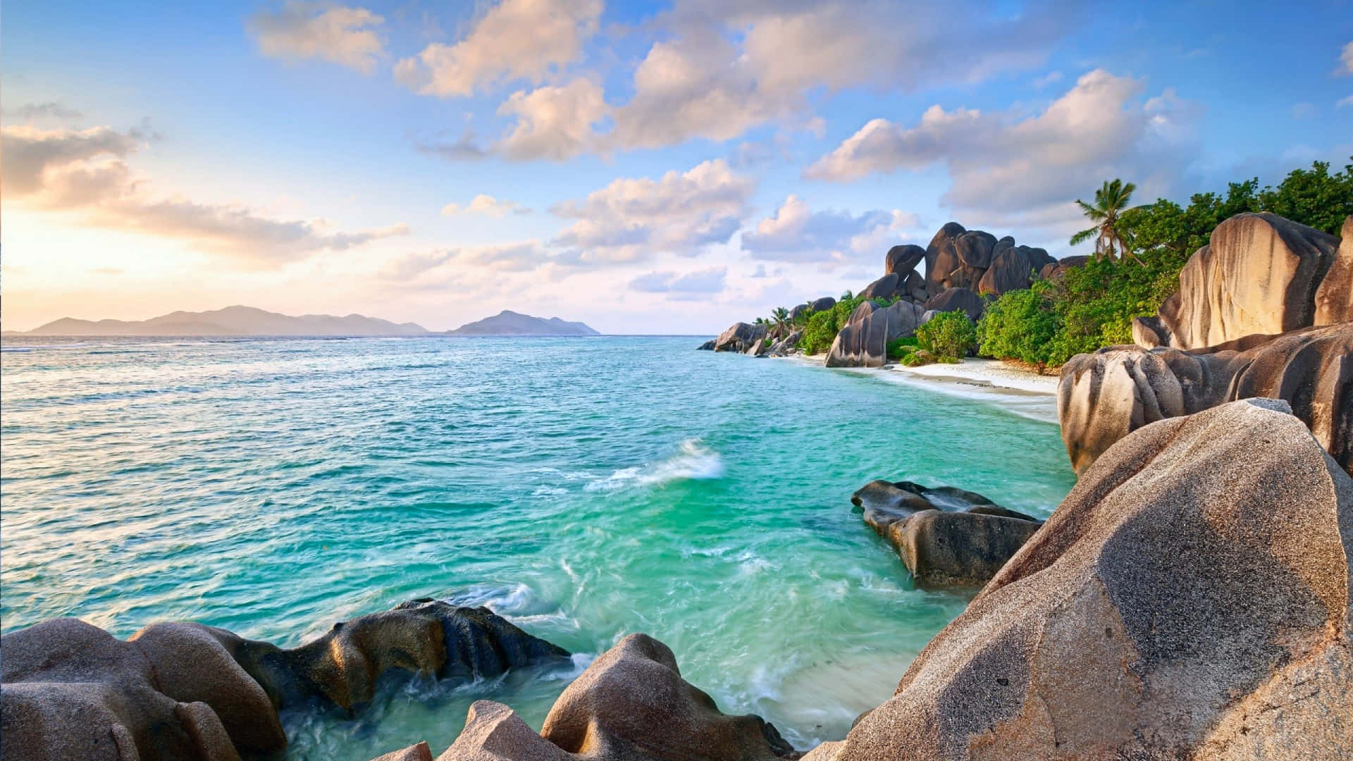 Unwind and Relax at this Tropical Beach Wallpaper