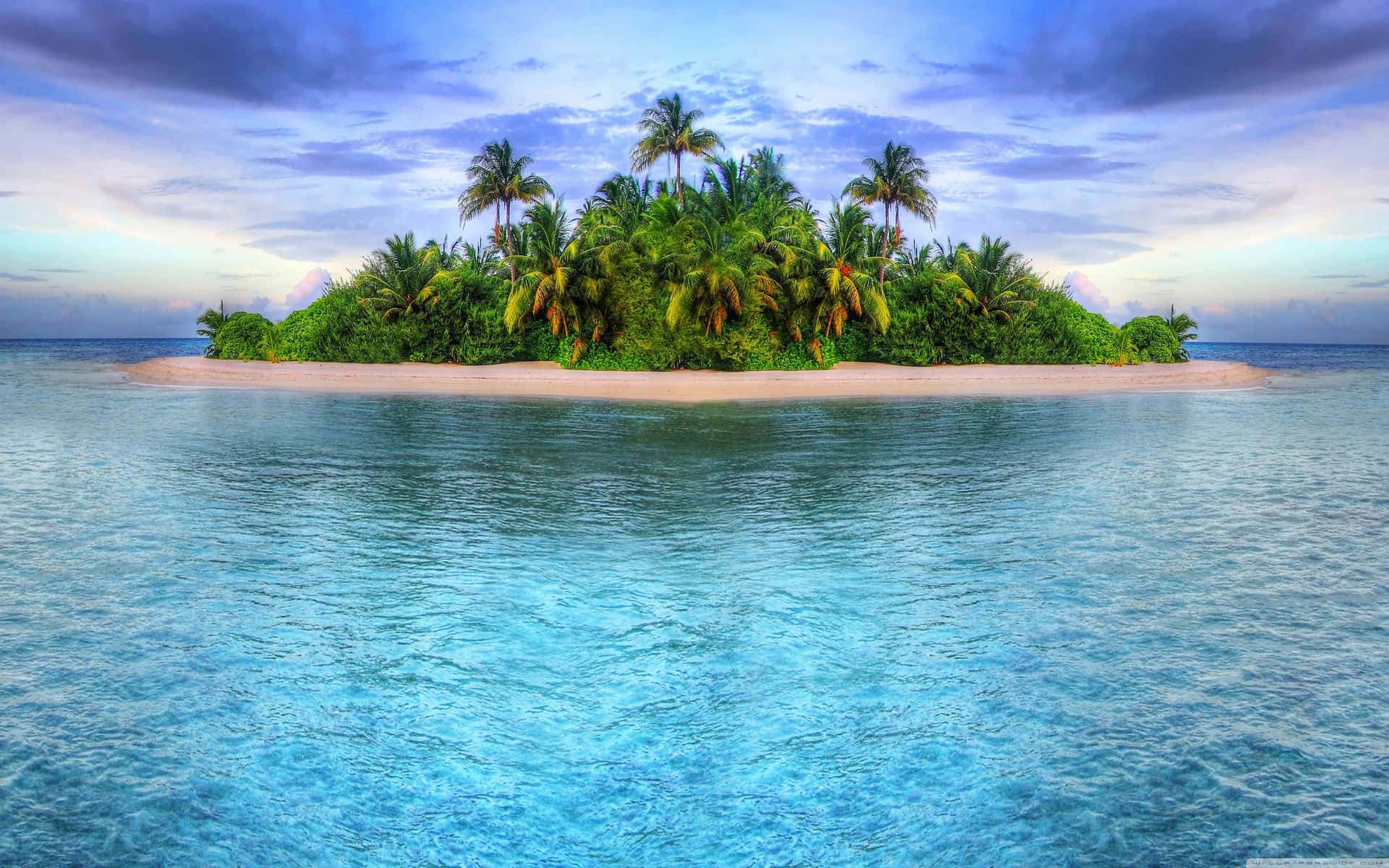 Enjoy the magical view of a lush tropical island Wallpaper
