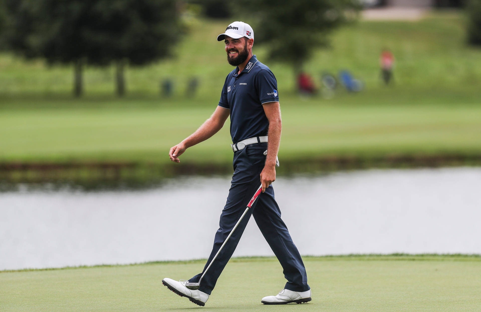 Troy Merritt, Smiling and Enjoying His Walk on the Golf Course Wallpaper