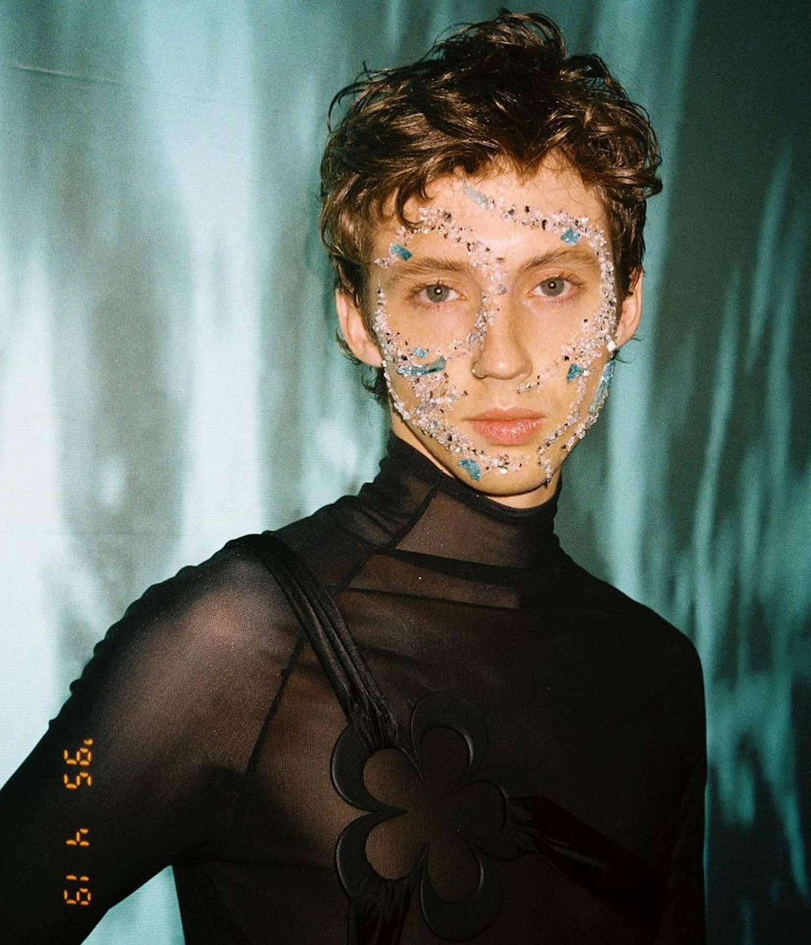 Rising Pop Star Troye Sivan's Radiant Crystal Face Art Wallpaper
