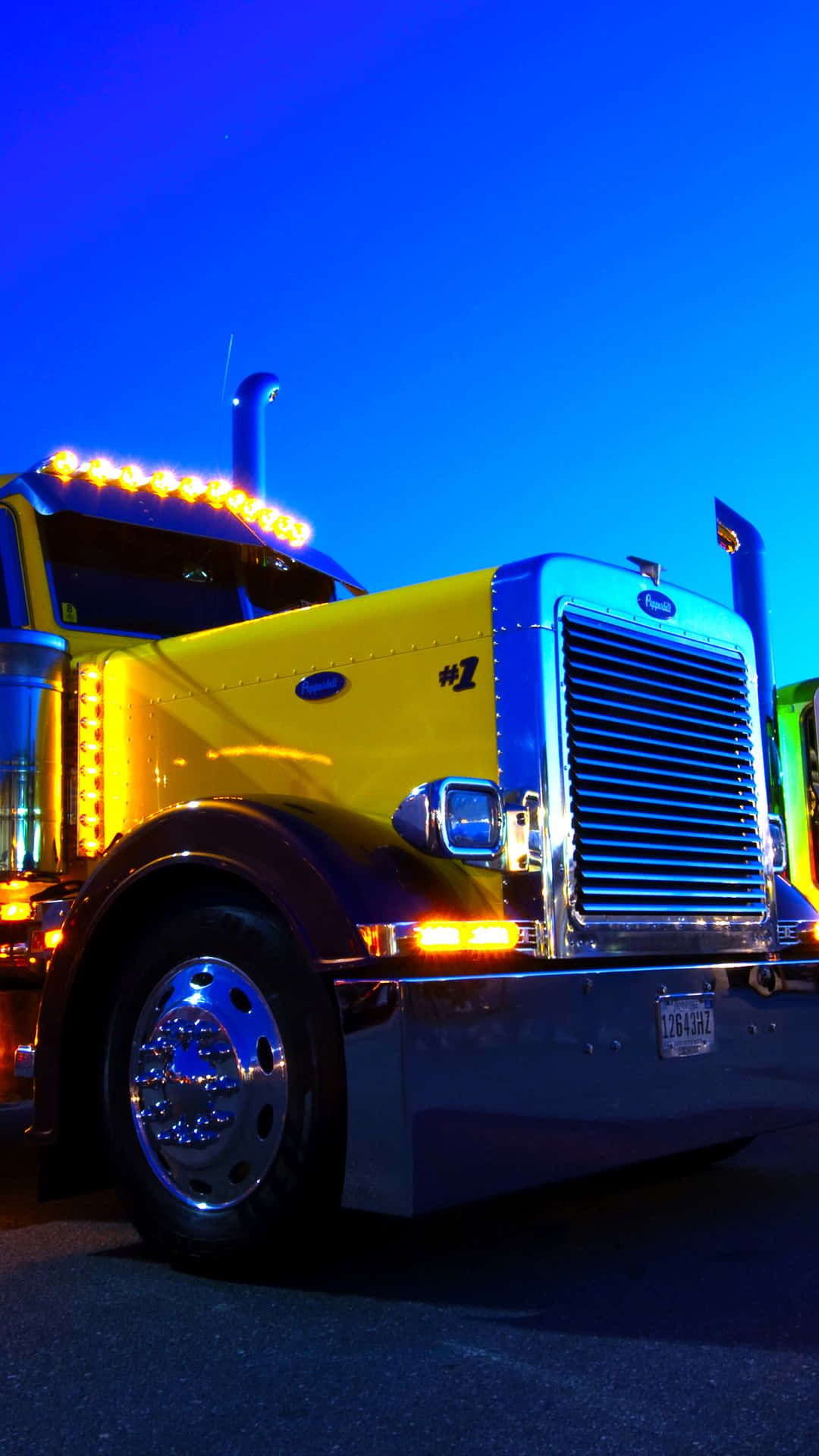 A White Kenworth Truck on a Navy Blue Background