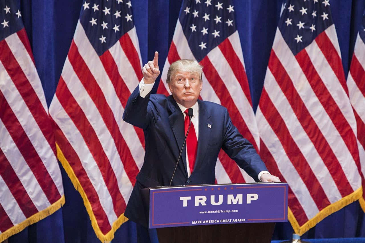 President Donald Trump delivering a speech at a rally