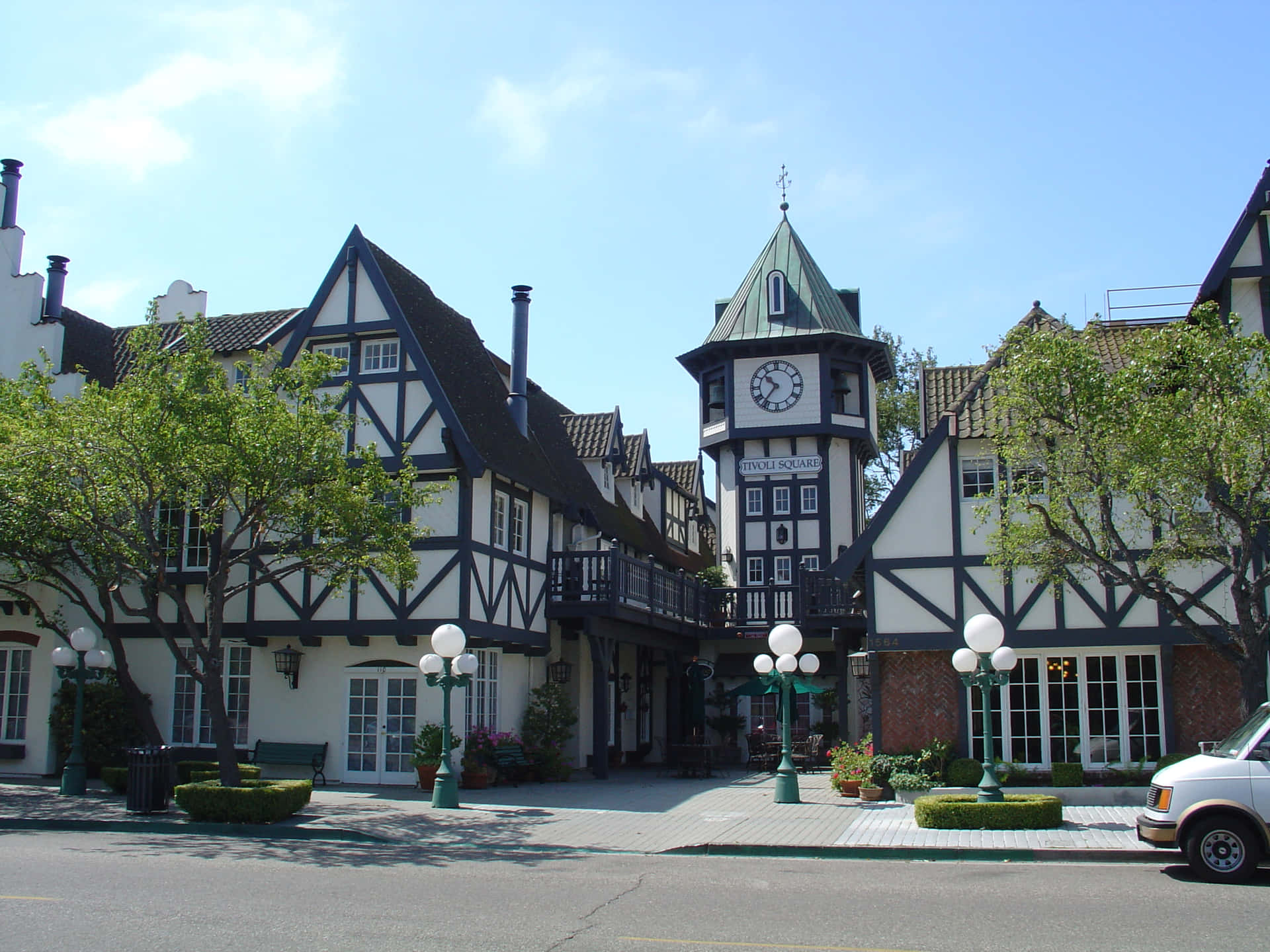 Tudor Style Buildingwith Clock Tower Wallpaper