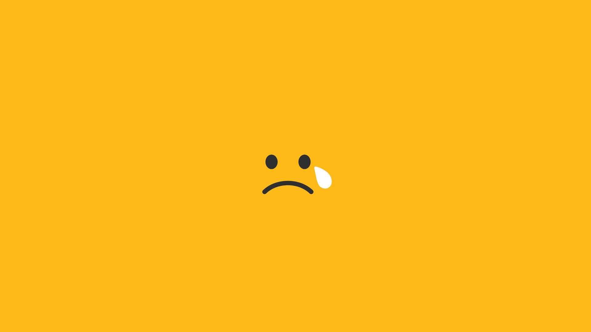 A Sad Face On A Yellow Background Wallpaper