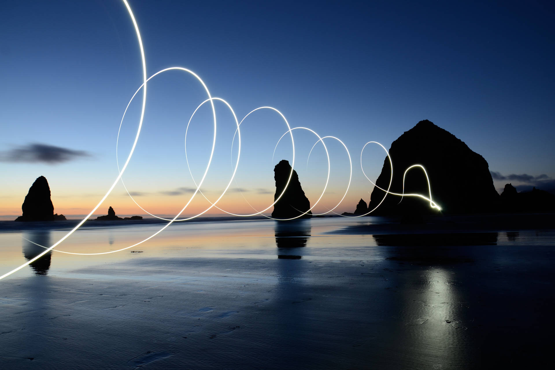 light painting on the beach at dusk Wallpaper