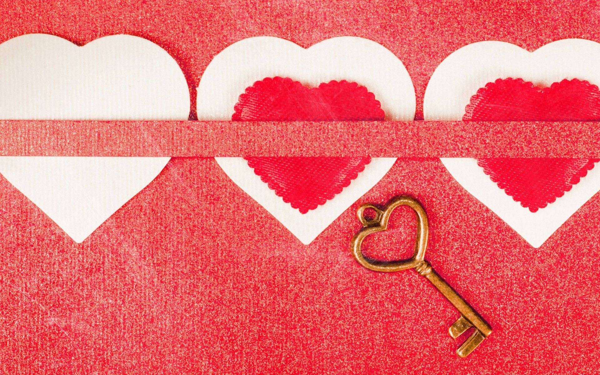 Three Hearts With A Key On A Red Background Wallpaper