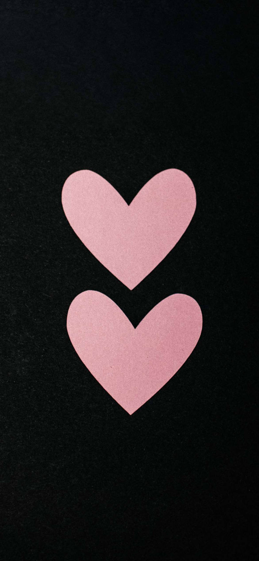 Two Pink Hearts On A Black Background Wallpaper