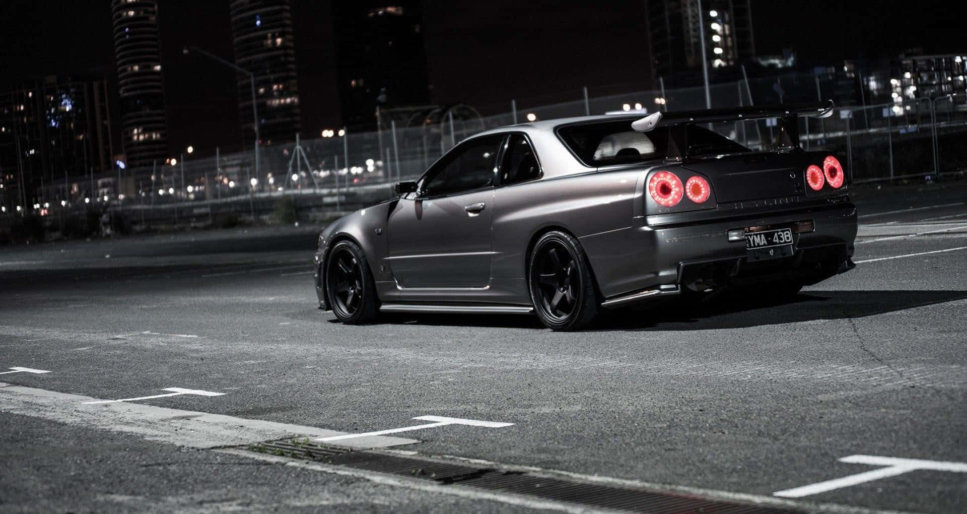 Stunning Nissan GTR Tuned Car Showcased in Vibrant Colors Wallpaper