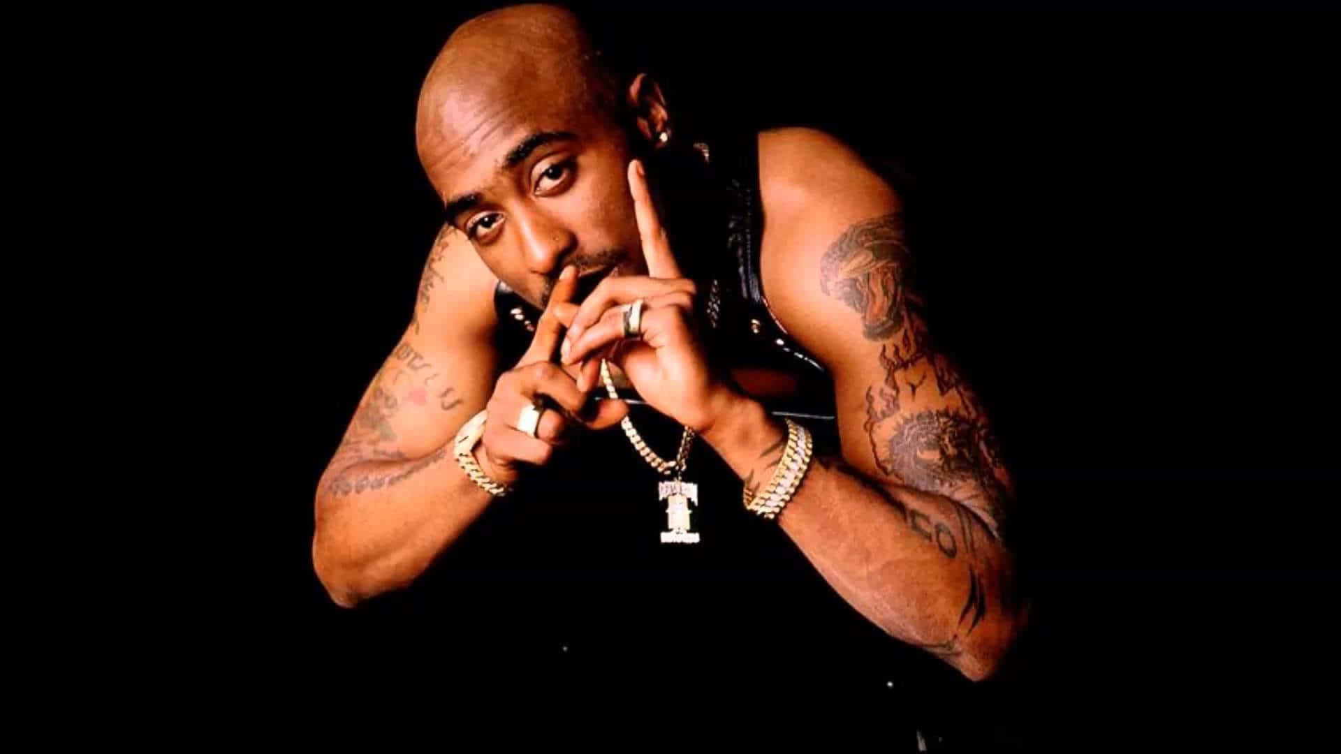 Legendary rapper Tupac Shakur striking a pose