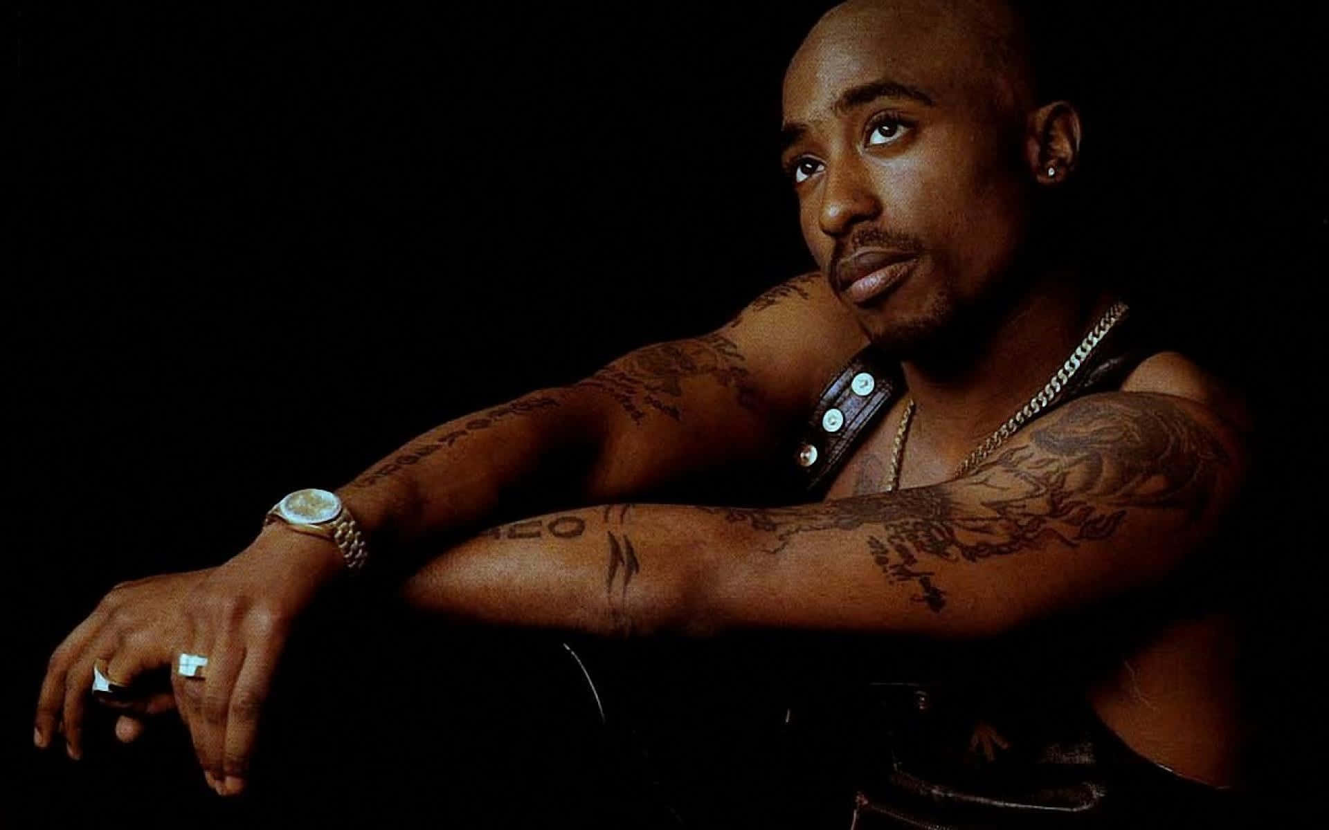 An iconic portrait of Tupac Shakur, legendary rapper and actor