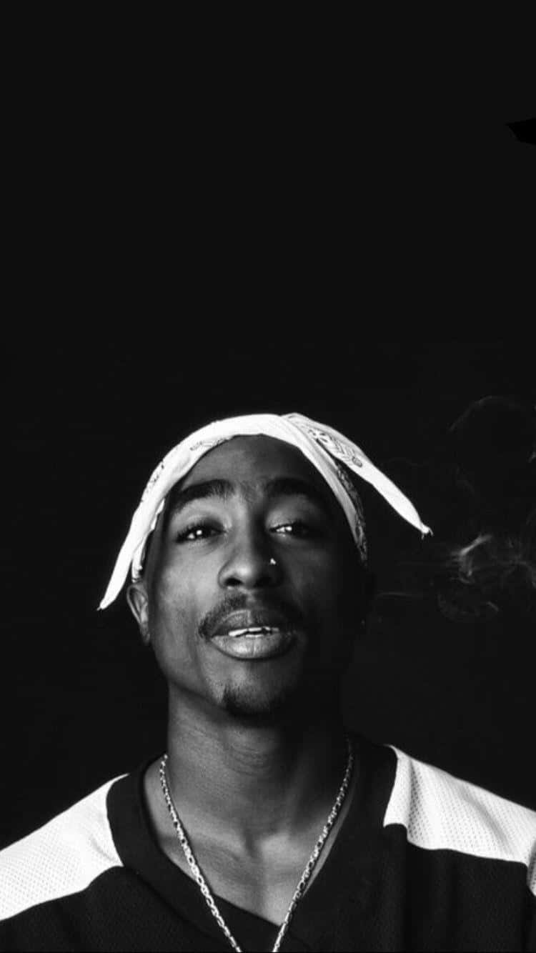 Celebrate Tupac's Legacy with this Tupac Iphone! Wallpaper