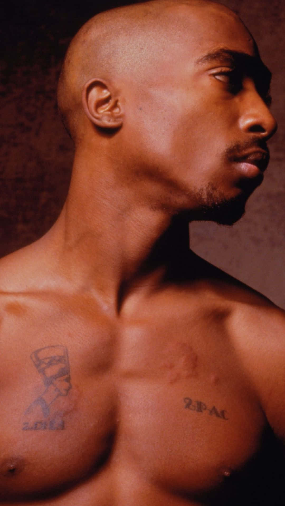 Side View Portrait Of Tupac Iphone Wallpaper