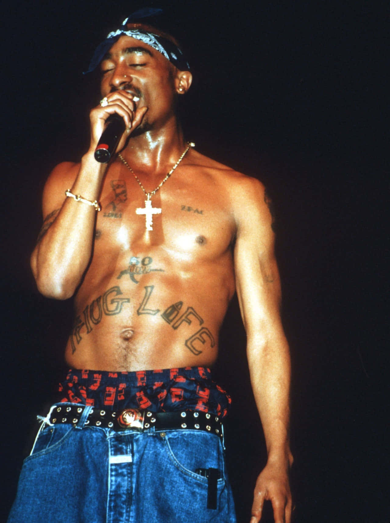 Tupac Shakur On Stage With A Microphone