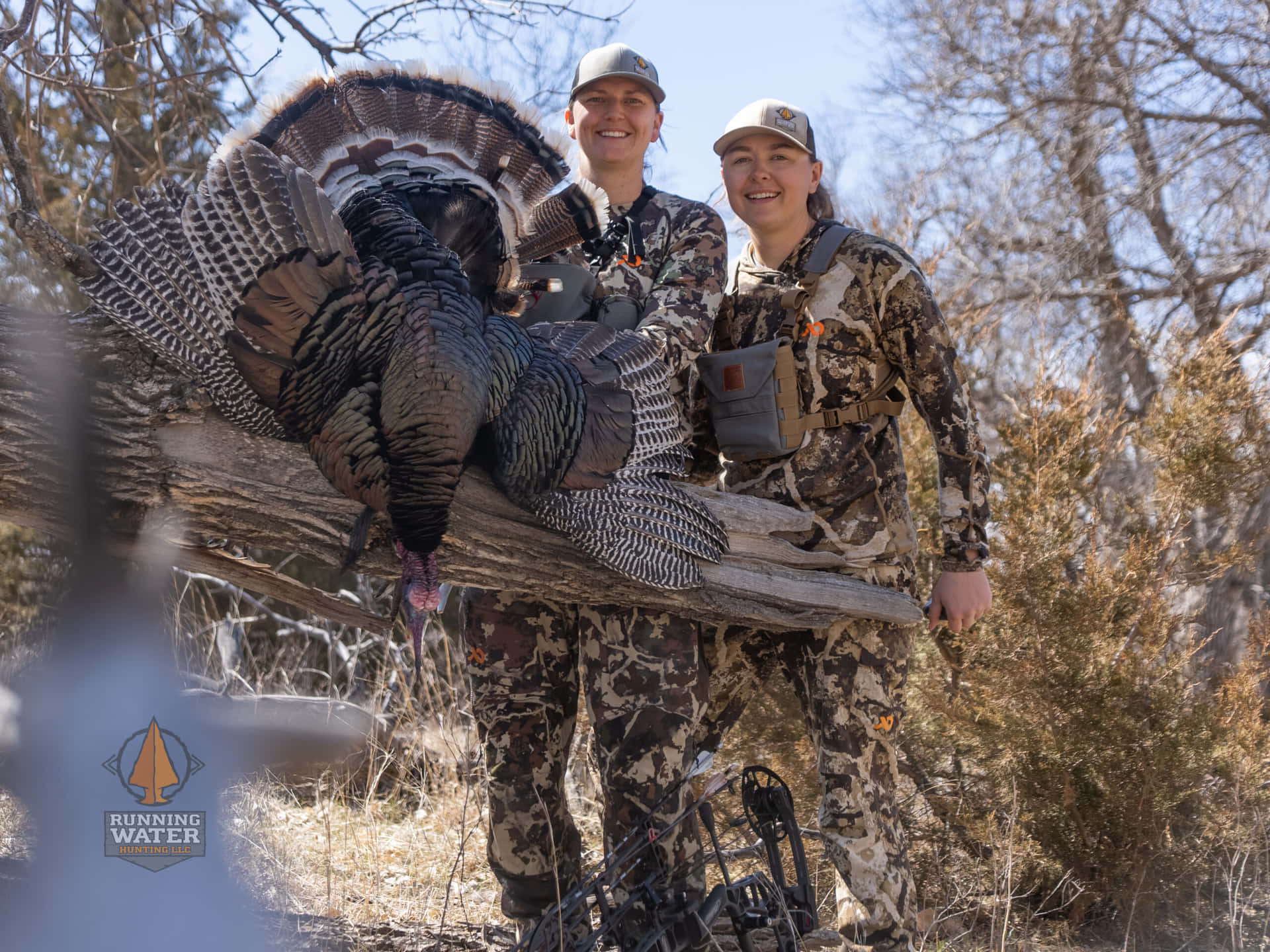 Two Hunters Pose With A Turkey Wallpaper