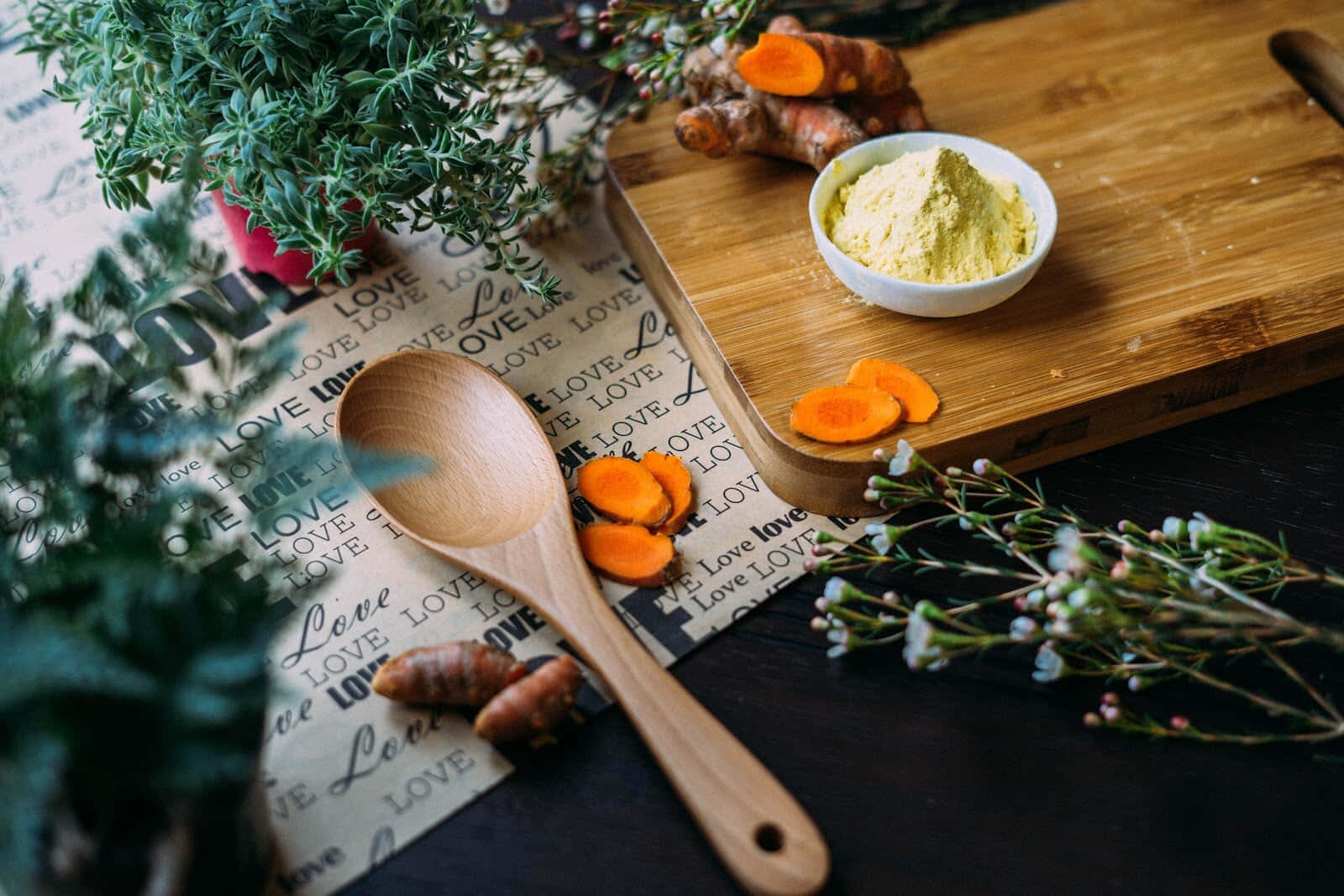 Turmeric Spices On Chopping Board With Common Baby's Breath Wallpaper