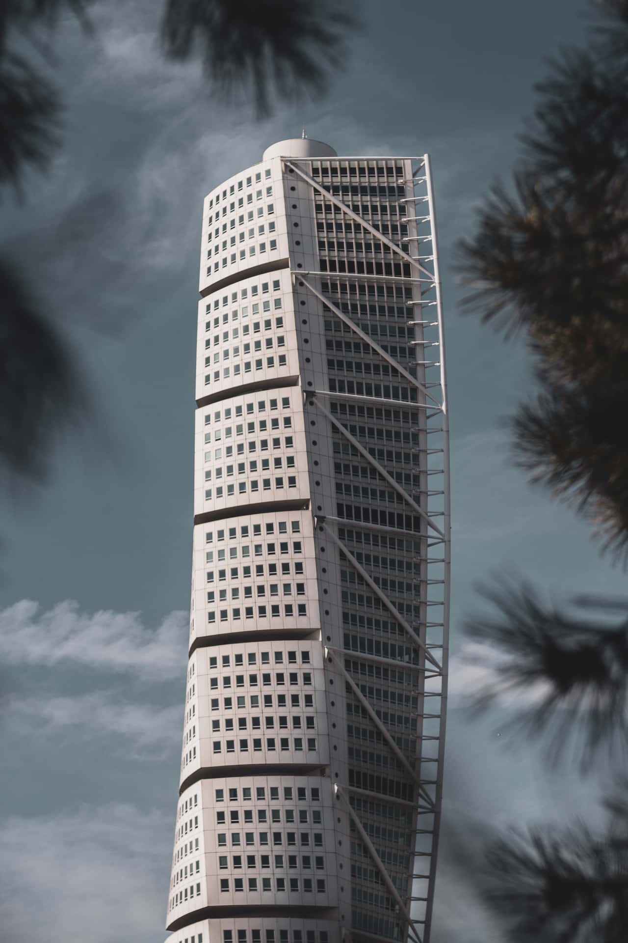 Turning Torso Phone Surrounded By Trees Wallpaper