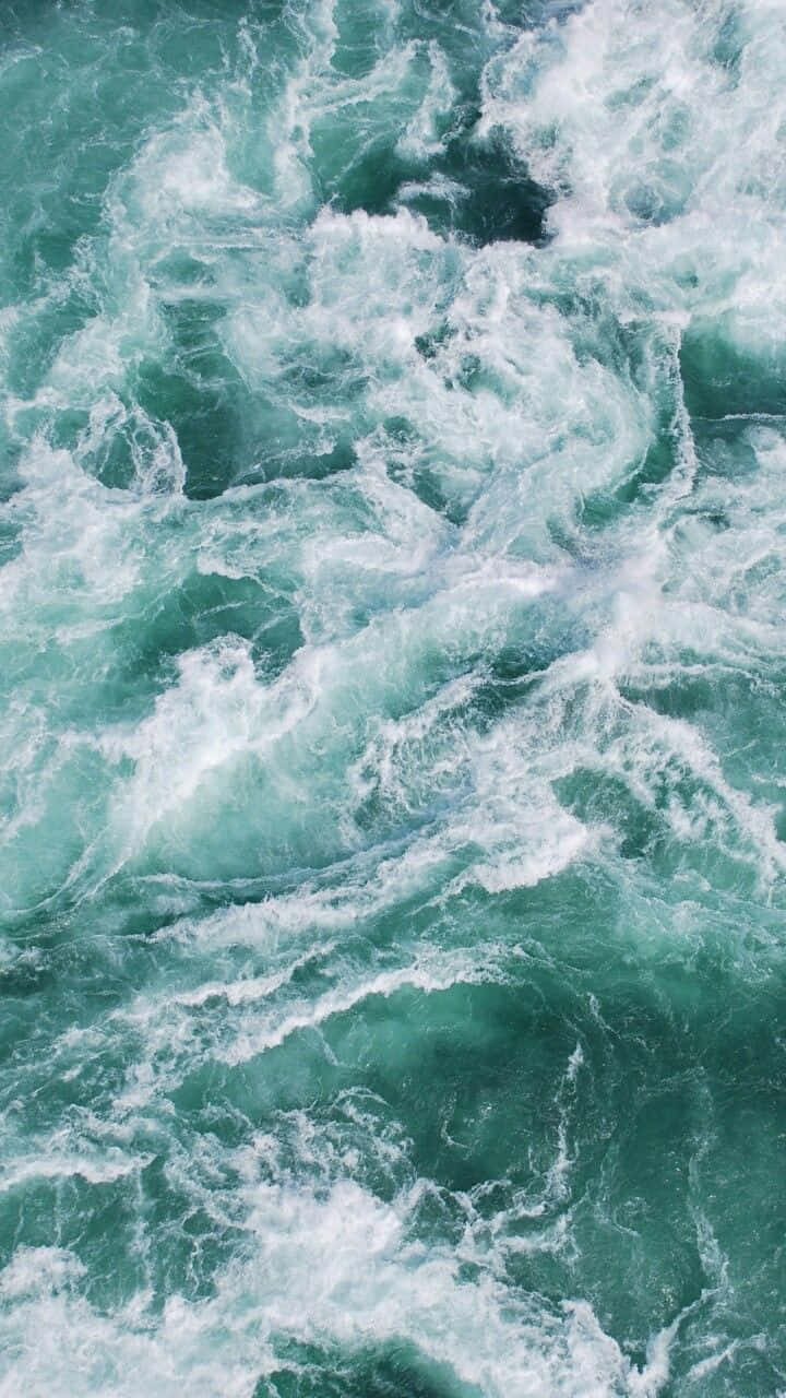 Turquoise_ Ocean_ Waves_ Texture_4 K_ U H D.jpg Wallpaper