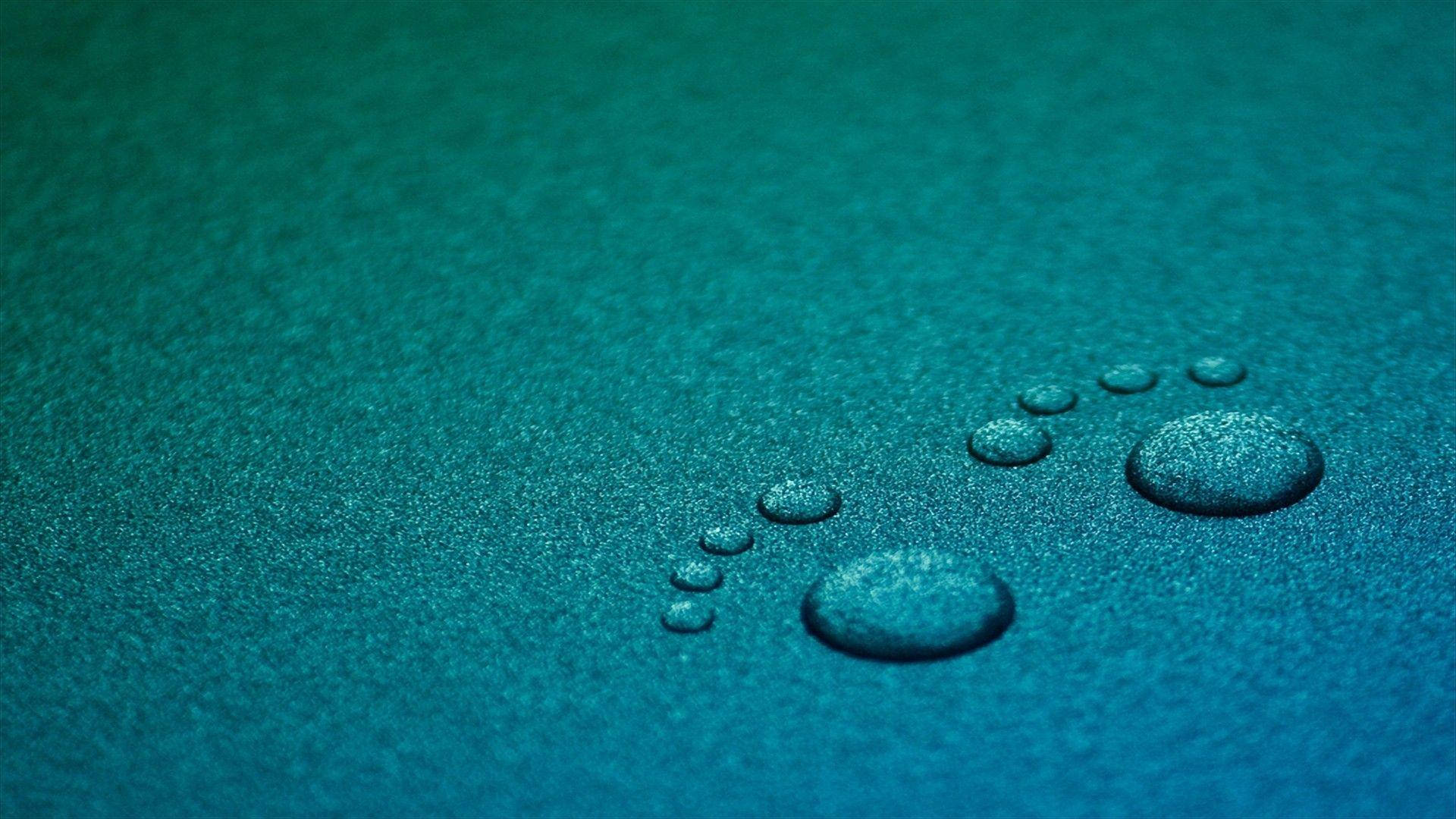 Turquoise Water Droplets Wallpaper