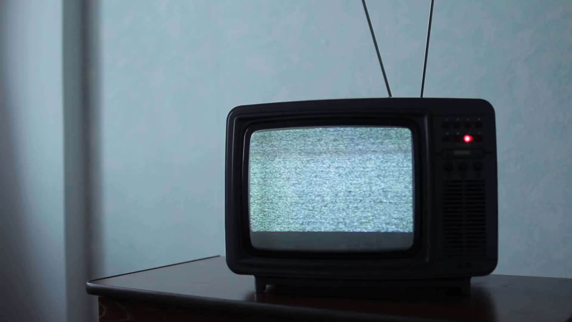 An Old Television Sitting On A Table