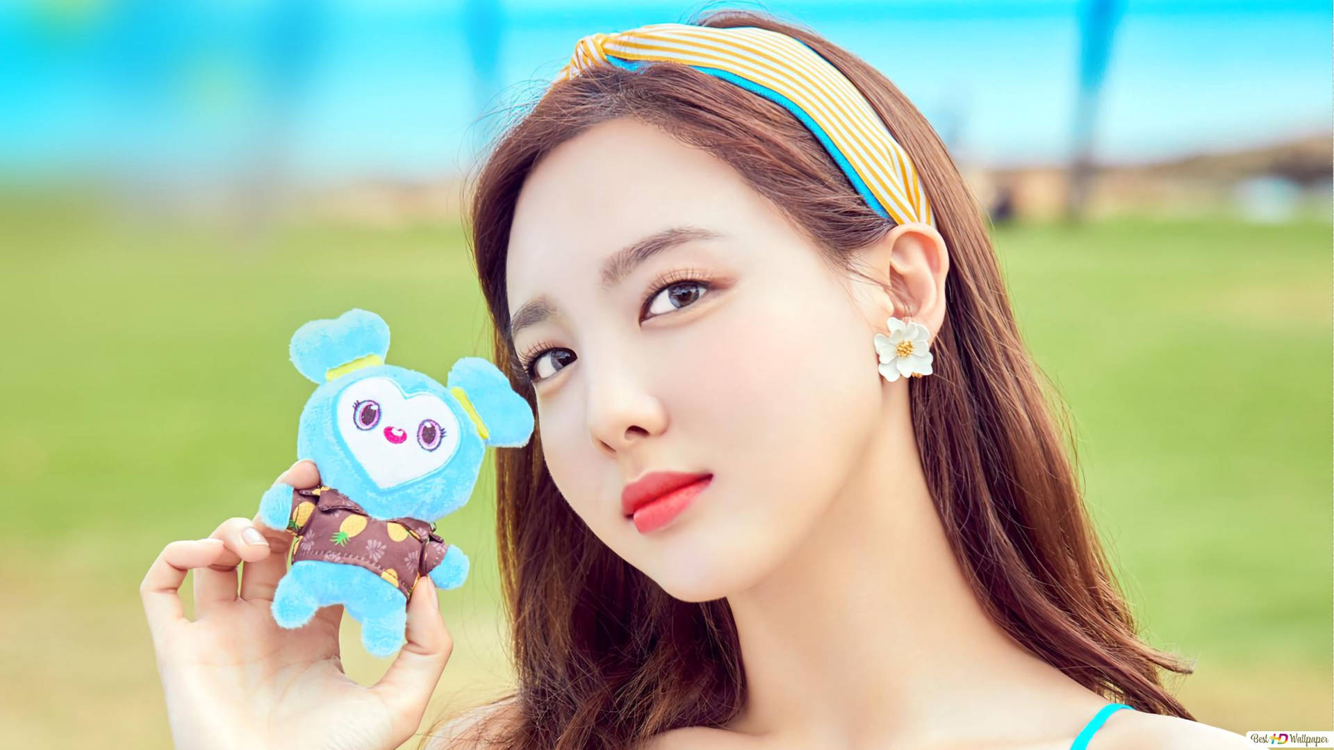 Twice Nayeon Holding A Stuff Toy Wallpaper