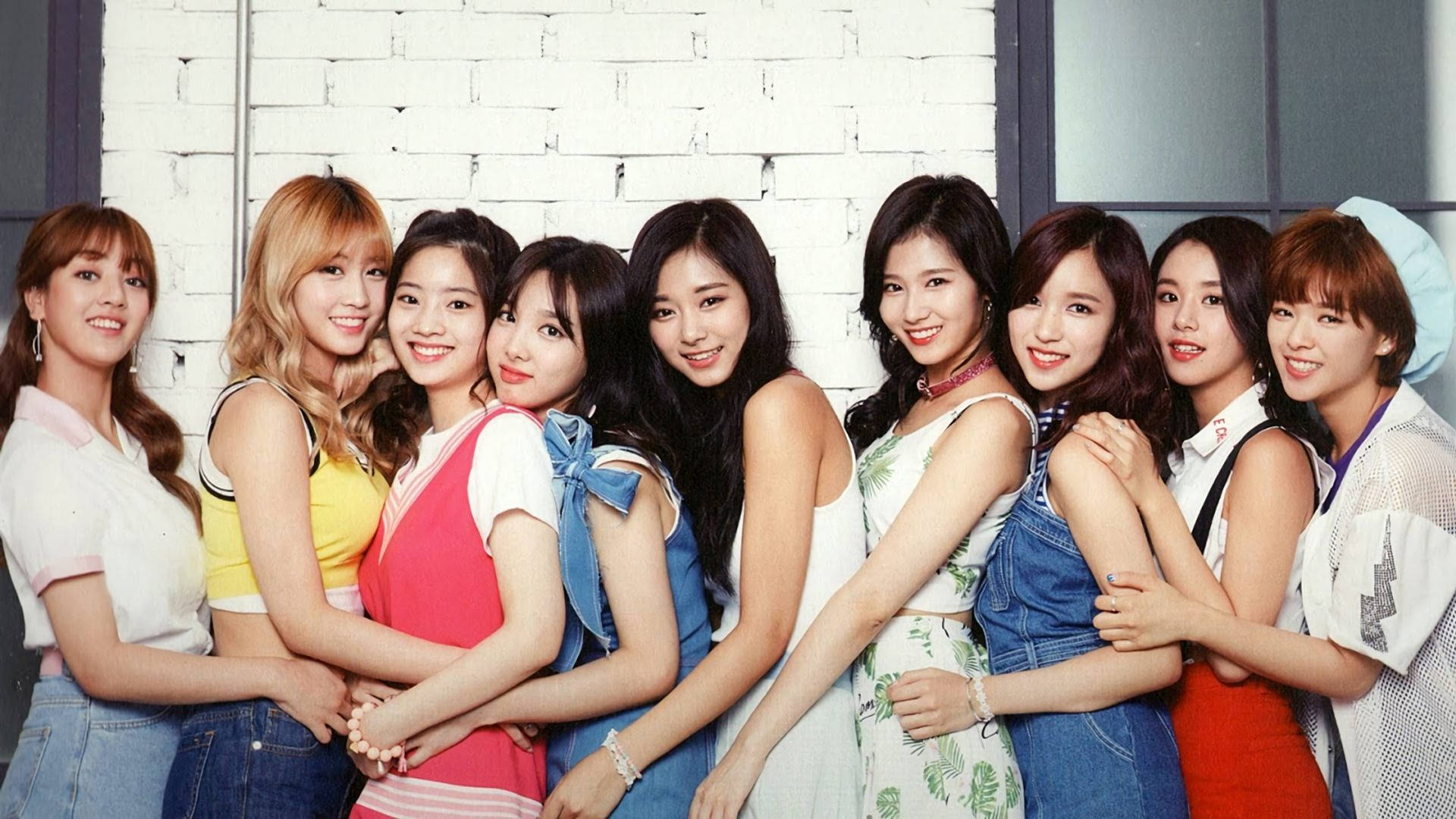 "The nine-member South Korean girl group TWICE striking a pose!" Wallpaper