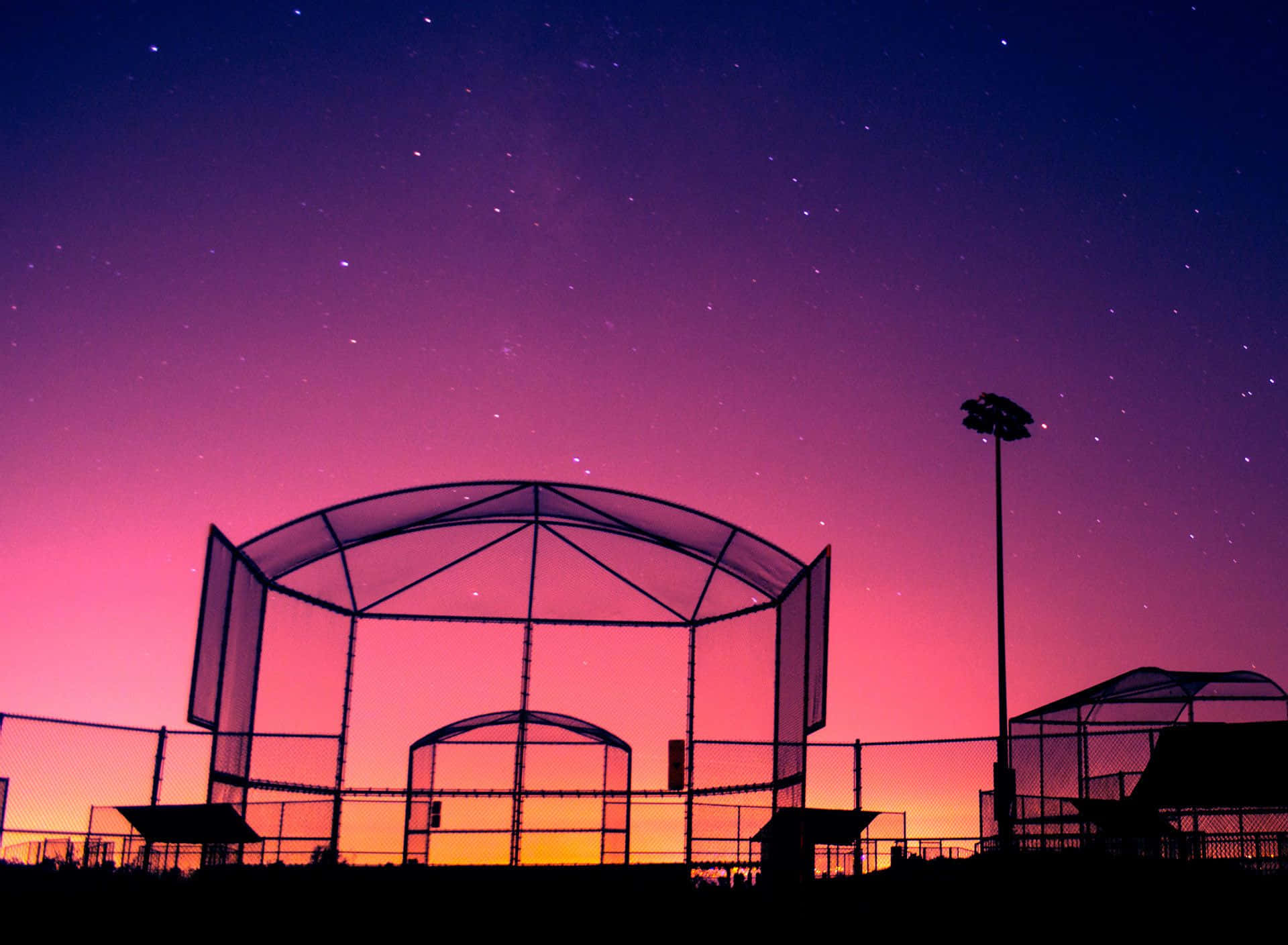 Twilight Softball Field Silhouette Wallpaper