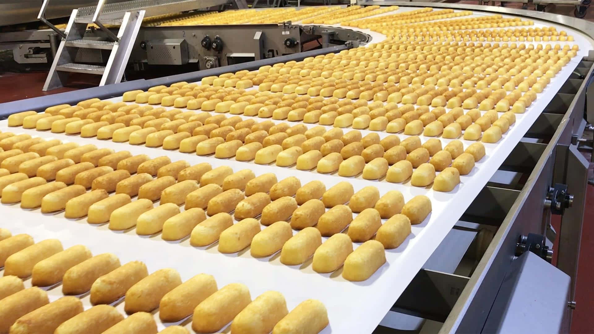 Twinkieson Conveyor Belt Production Line Wallpaper