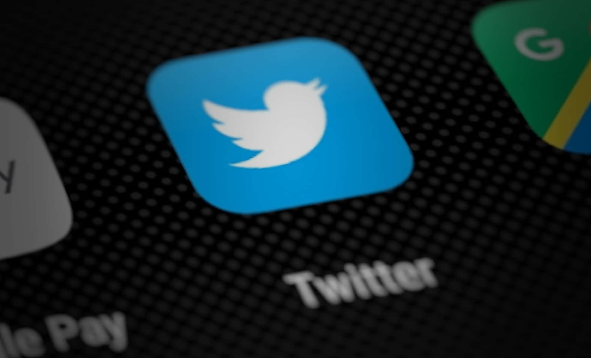 Twitter Logos On A Black Screen