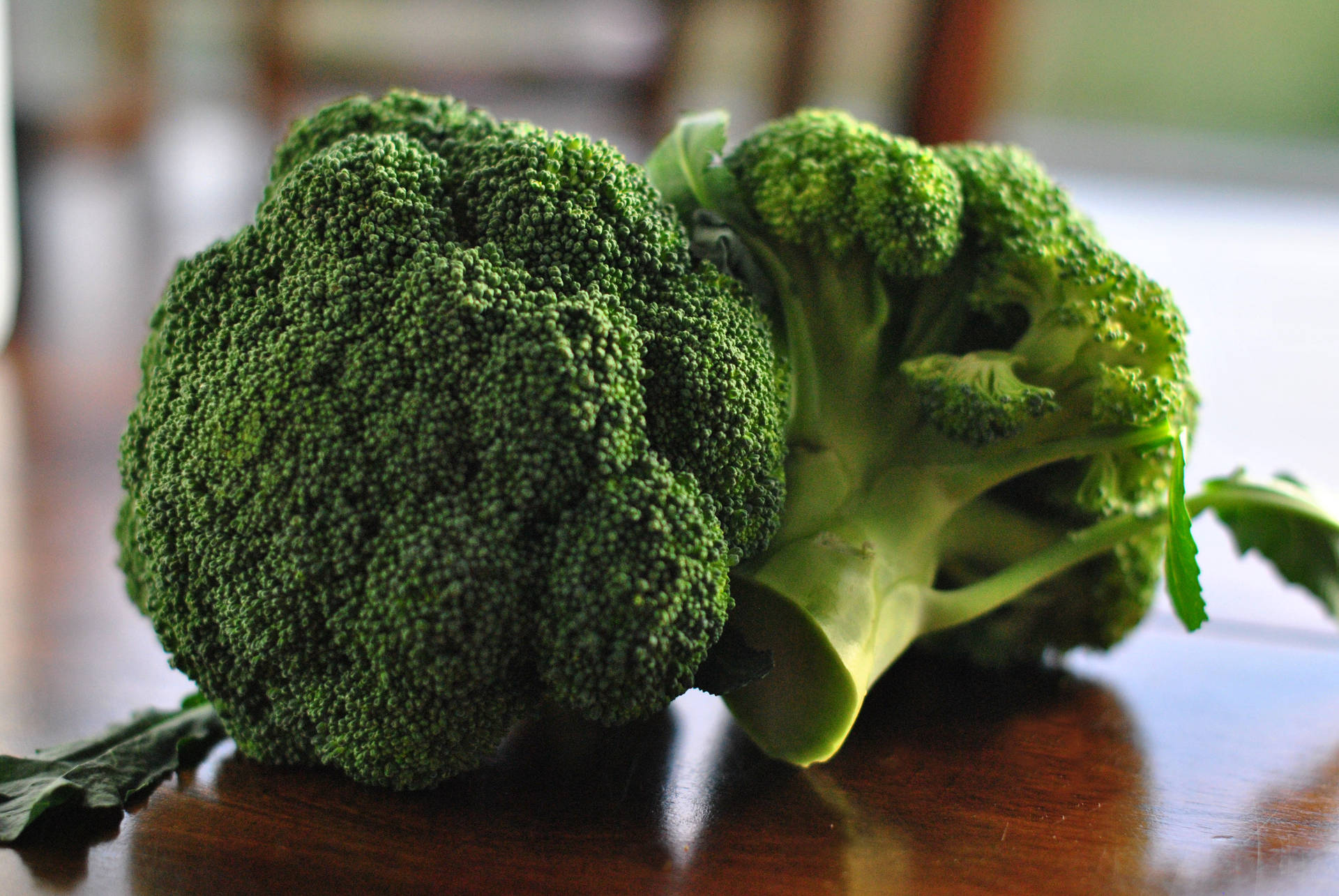 Two Broccoli On Brown Table