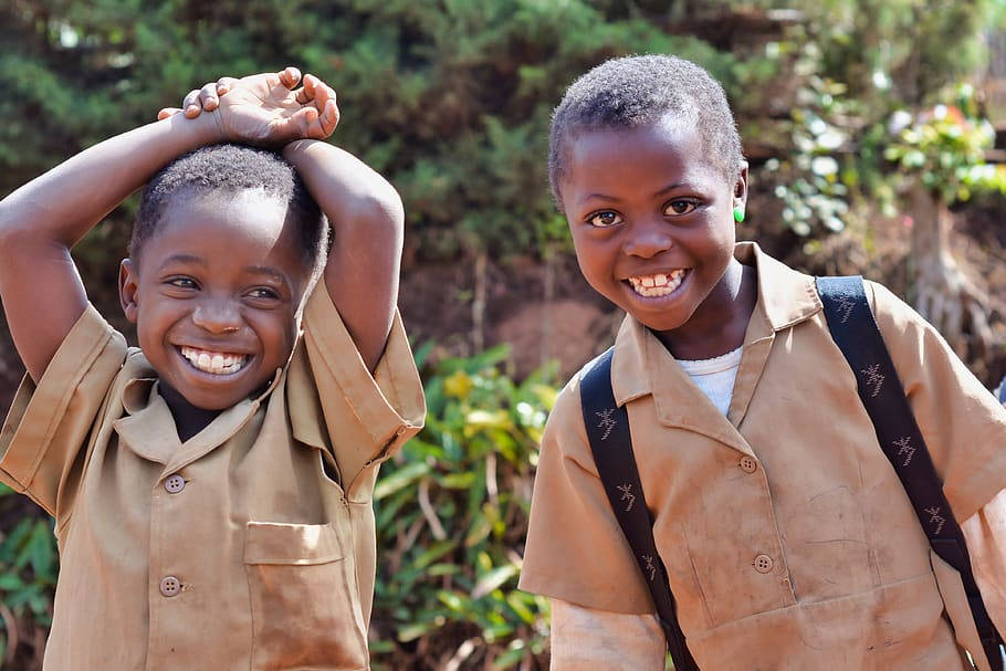 Two Cameroon Boys Smiling Brightly Wallpaper