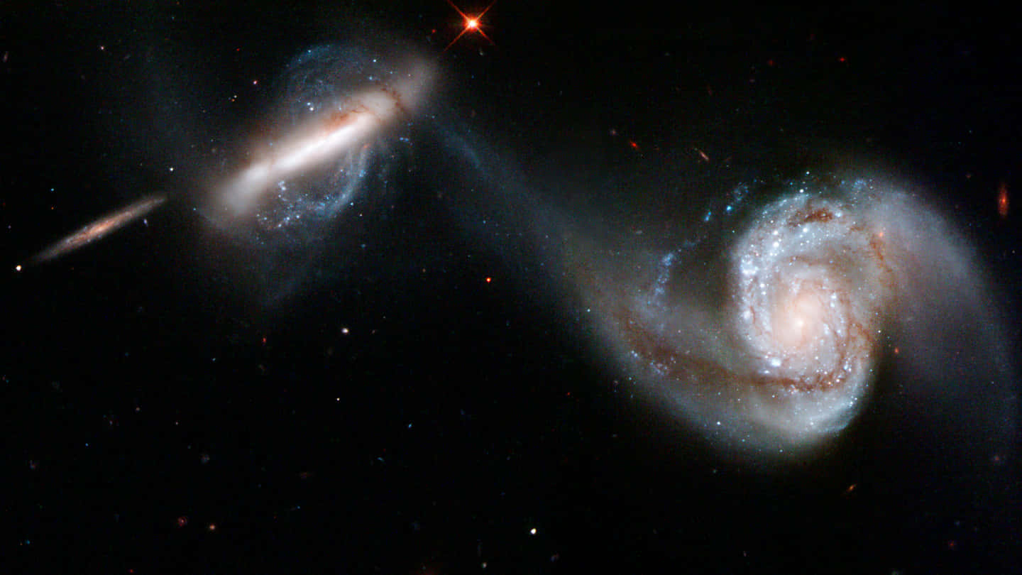 Duasgaláxias No Espaço Astronômico. Papel de Parede
