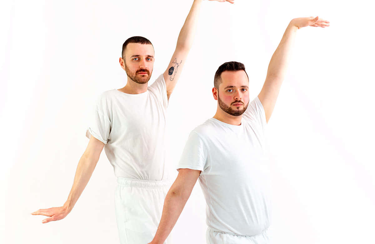 Two Gay Boys In White Posing Picture