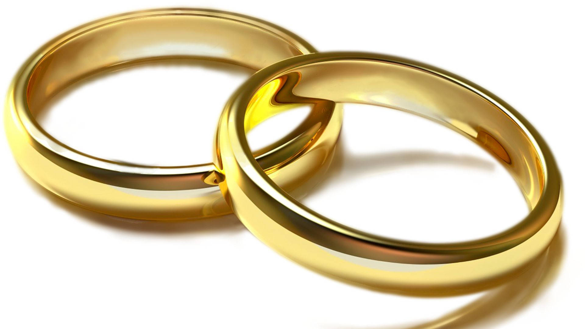 Two Gold Wedding Rings Wallpaper
