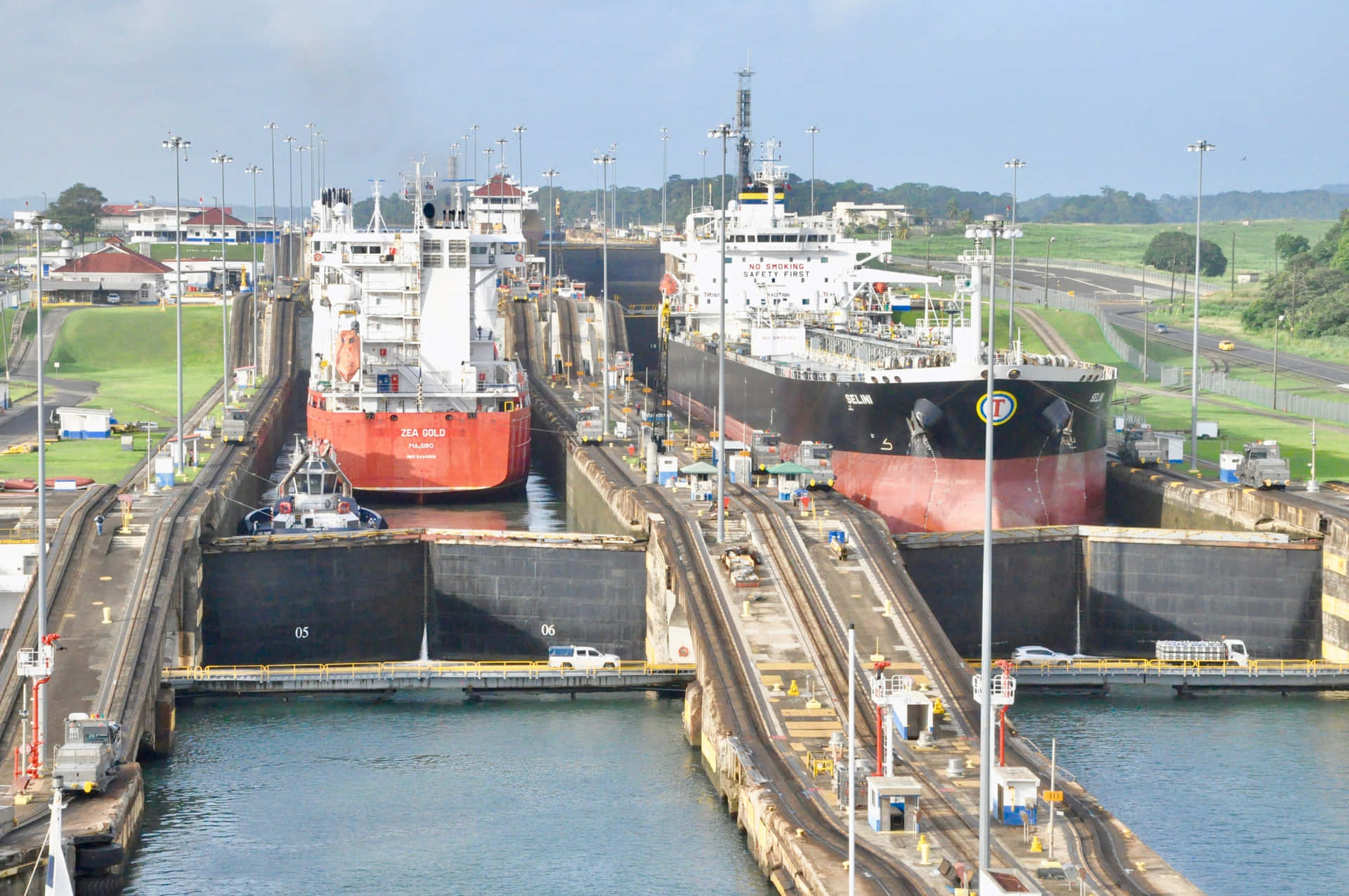 Caption: The Masterpiece of Engineering - Two Giant Ships Voyaging through the Panama Canal Wallpaper