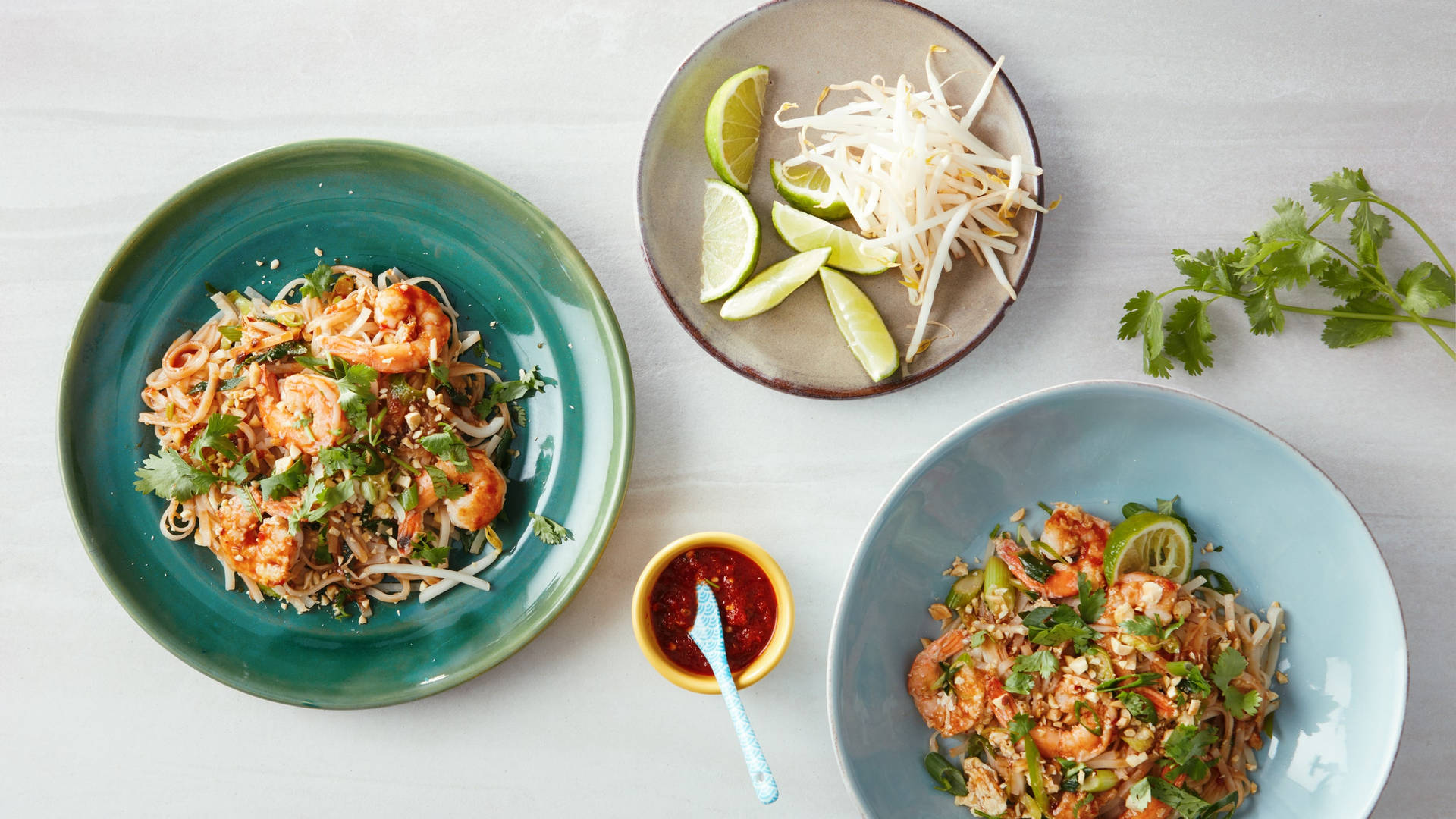 Two Platters Of Pad Thai Noodles Wallpaper