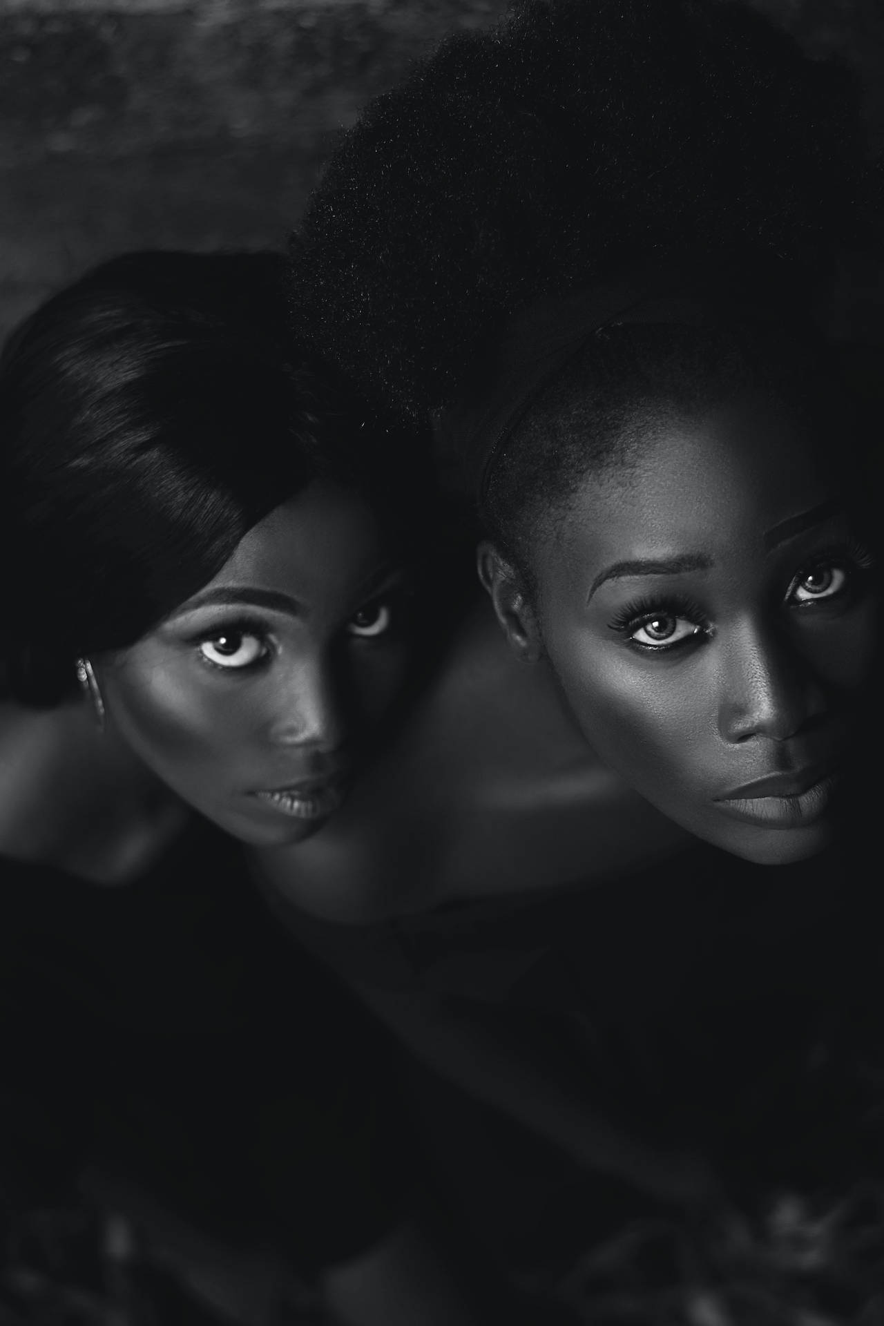 Two Sexy Black Women Looking Up Wallpaper