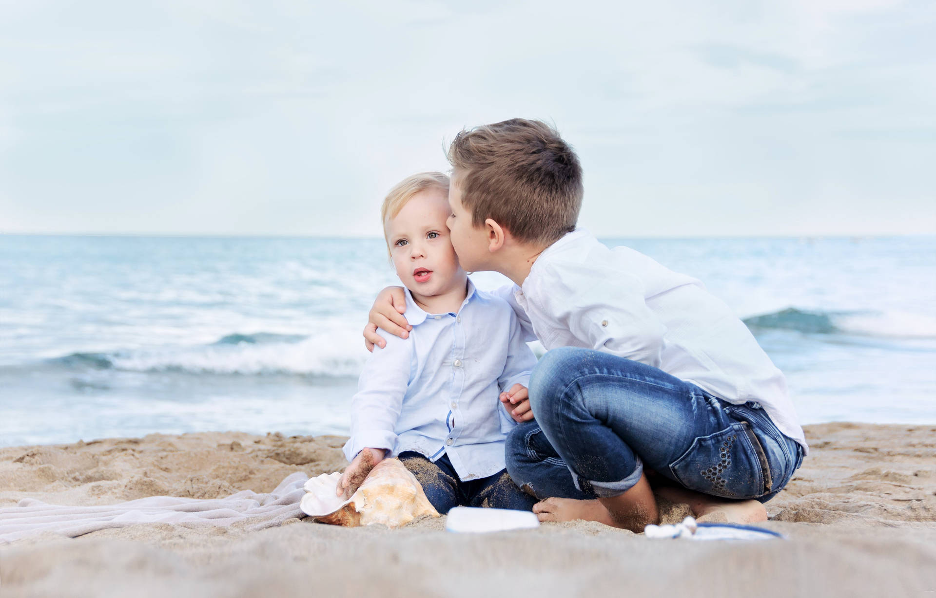 Two Toddler Boys On The Sand Wallpaper