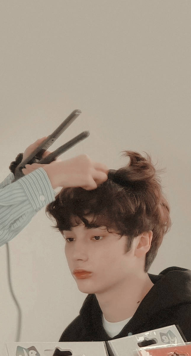 Txt Huening Kai Getting His Hair Fixed Wallpaper
