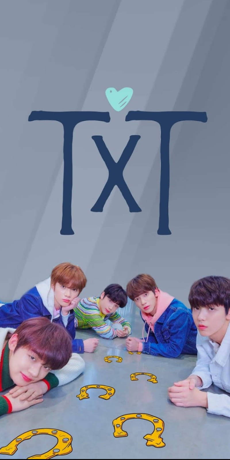 Txt Sitting By A Table Wallpaper