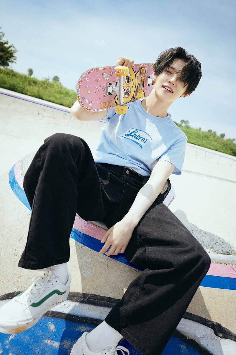 Txt Yeonjun With A Skateboard Wallpaper