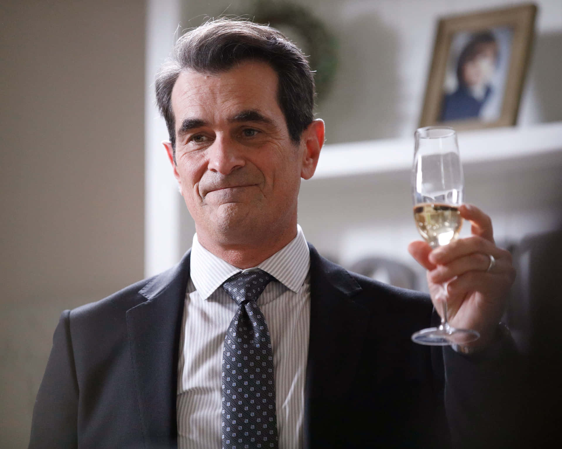 Ty Burrell Smiling Radiantly in a Casual Photoshoot Wallpaper