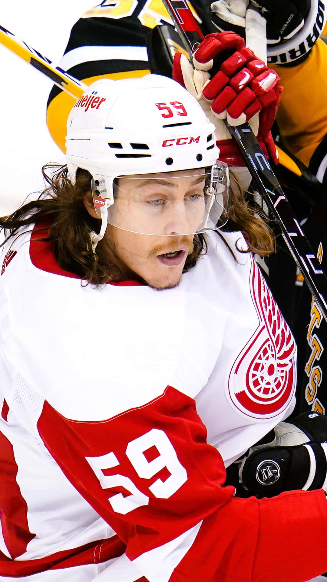 Tyler Bertuzzi in action with the Detroit Red Wings Wallpaper
