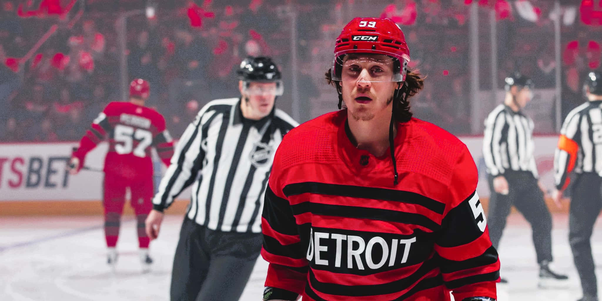 Download Tyler Bertuzzi in action during a hockey game Wallpaper