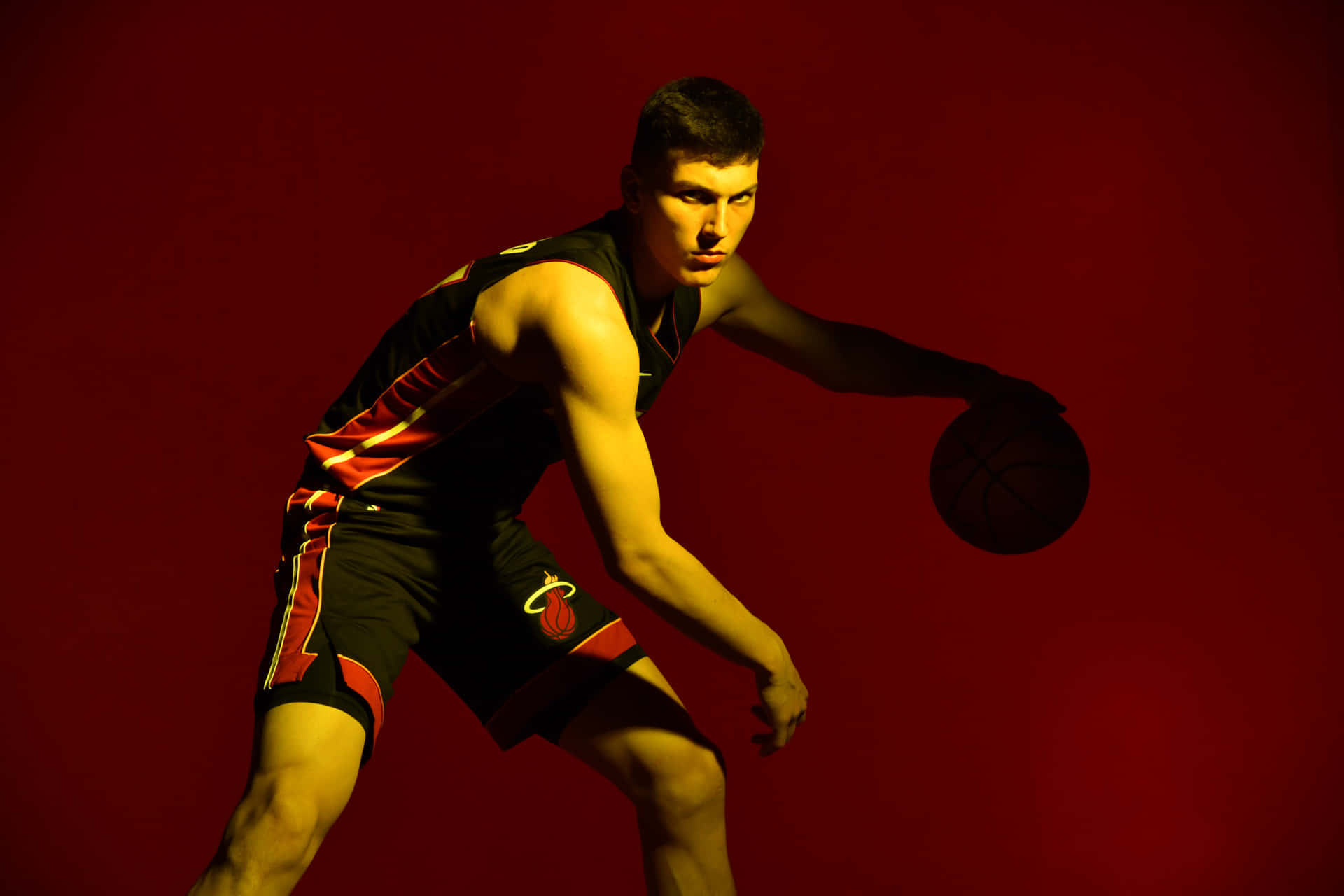 Tyler Herro Takes Flight with Miami Heat Wallpaper