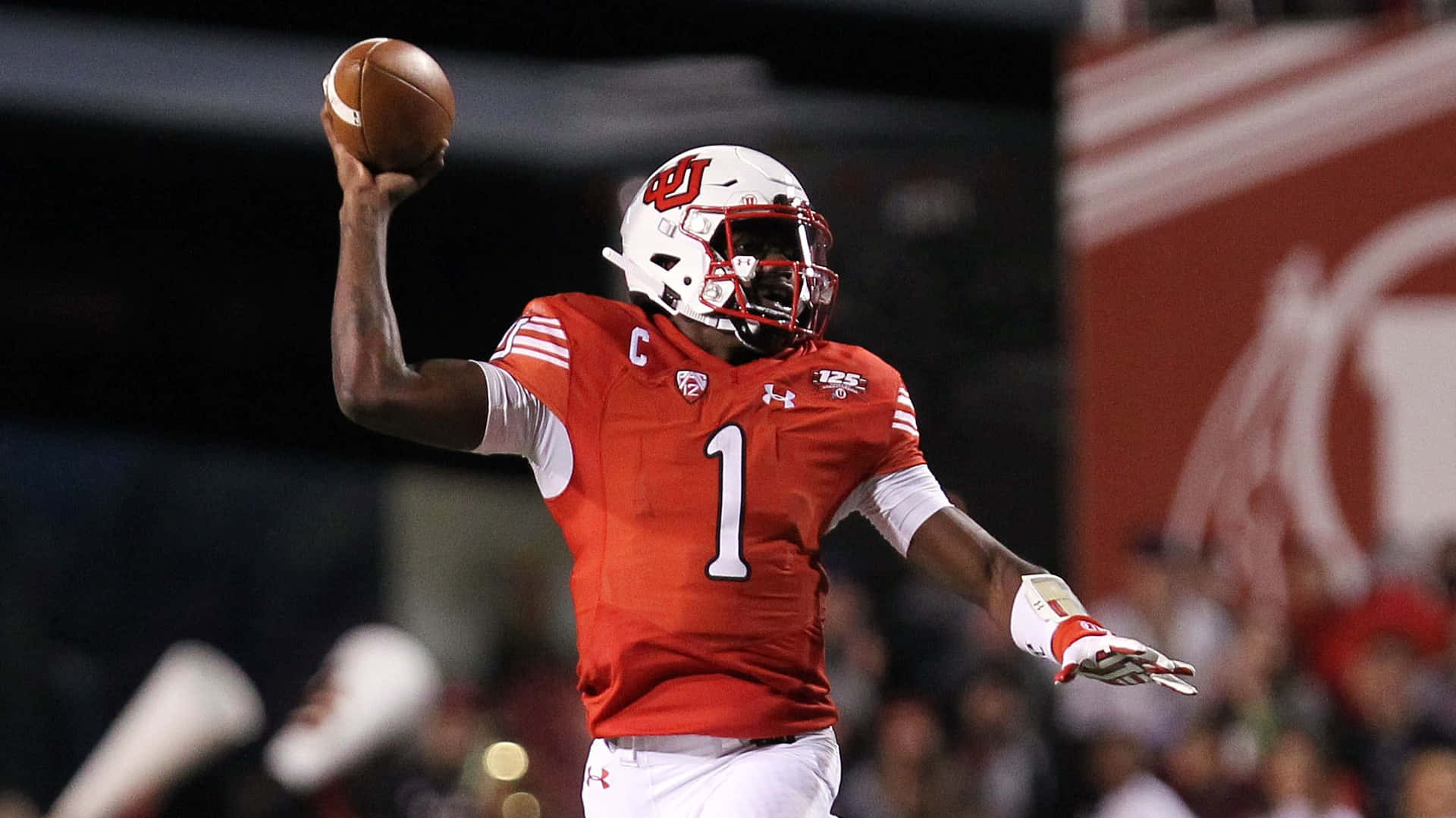 Tyler Huntley Quarterback Action Shot Bakgrunnsbildet