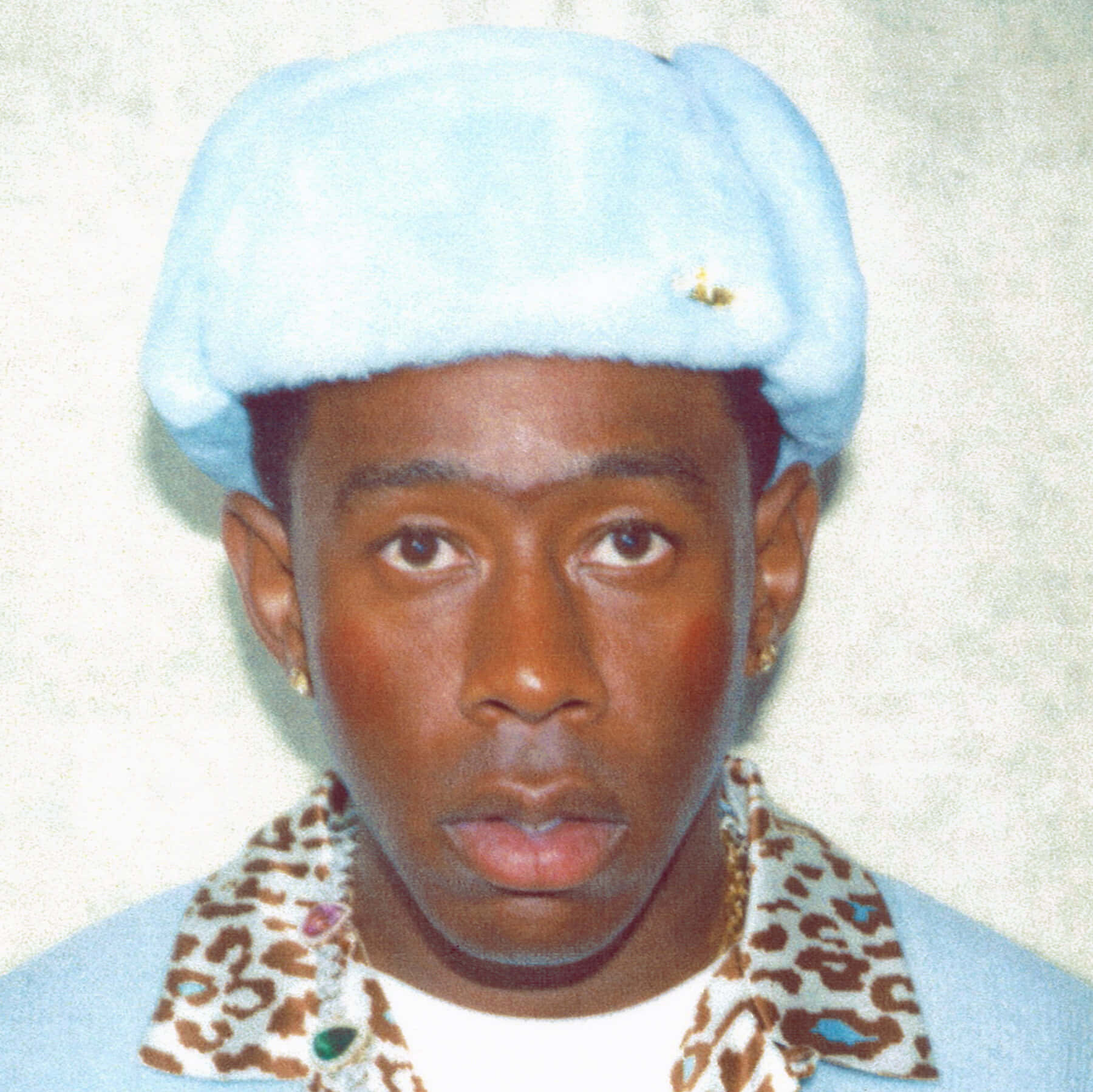 Tyler The Creator radiates confidence with a satisfied smile